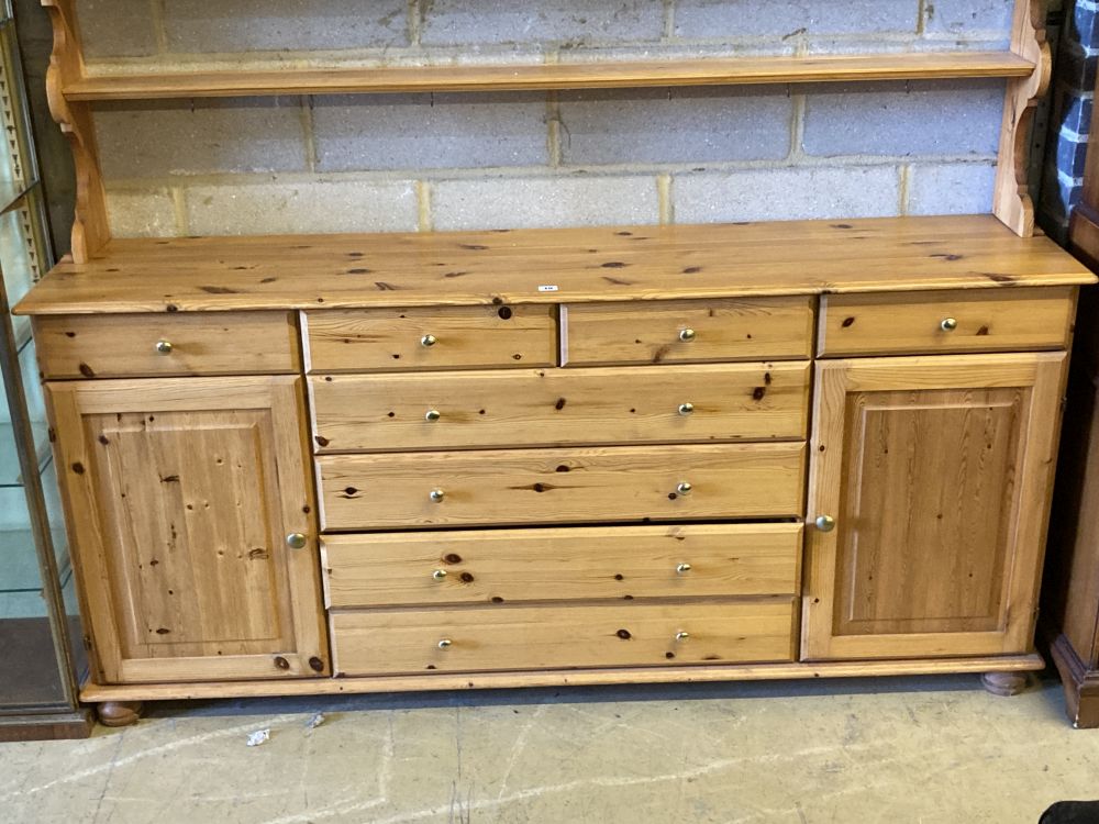 A modern Victorian style pine dresser, width 178cm, depth 38cm, height 195cm